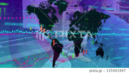 Displaying world map overlay with candlestick and trend data points in office lounge with tablet Displaying world map overlay with candlestick and trend data points in office lounge with tablet 135401947