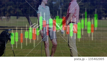 Smiling gloved golfers wearing polos holding clubs on fairway, golf bag, grid  and  candlestick over 135402005