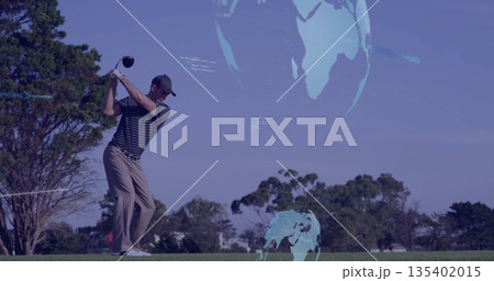 Preparing adult golfer swinging driver on golf course fairway, with golf glove and globe graphics 135402015