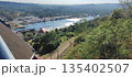 High viewpoint overlooking river and surrounding residential houses 135402507