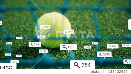 Yellow tennis ball pressing against blue tennis net on green court, with floating UI icons Yellow tennis ball pressing against blue tennis net on green court, with floating UI icons 135402925