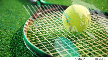 Lying tennis racket with taut strings on grass court, with yellow ball and digital overlay graphics Lying tennis racket with taut strings on grass court, with yellow ball and digital overlay graphics 135403617