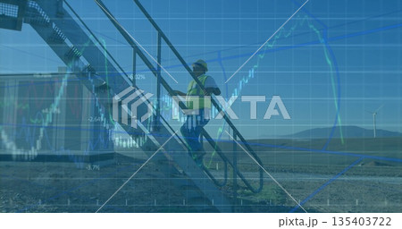 Ascending engineer wearing vest and hat on metal staircase with wind turbines, financial charts Ascending engineer wearing vest and hat on metal staircase with wind turbines, financial charts 135403722