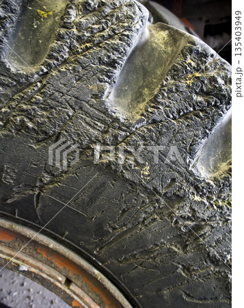 Very wear and tear old tire surface 135403949