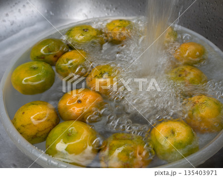 The Orange fruit soke and wash in the water The Orange fruit soke and wash in the water 135403971