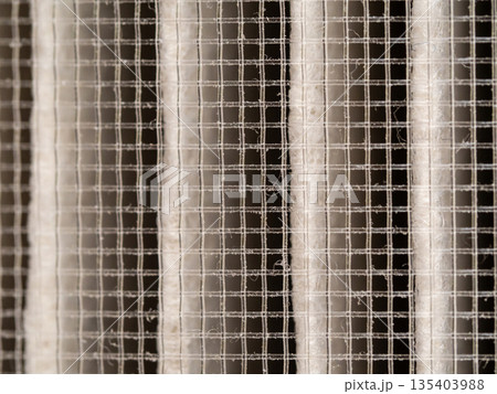 Surface of nylon mesh and filter paper in the dust filter 135403988
