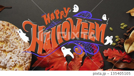 Happy Halloween text image over autumn leaves and pumpkin pie Happy Halloween text image over autumn leaves and pumpkin pie 135405105