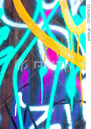 Abstract Graffiti Art with Turquoise, Yellow, White, Purple Spray Paint on wall, Urban Street Style 135405812