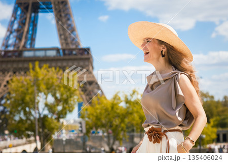 Radiant Parisian Joy in Front of Eiffel Tower Radiant Parisian Joy in Front of Eiffel Tower 135406024