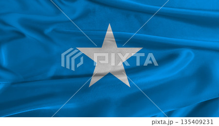 Flag of Somalia with fabric textured background. Close up of National flag of Somalia with realistic texture Flag of Somalia with fabric textured background. Close up of National flag of Somalia with realistic texture 135409231