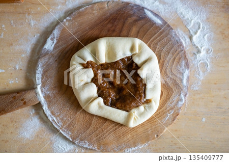 Prepared pastry for baking, top down view of homemade food Prepared pastry for baking, top down view of homemade food 135409777