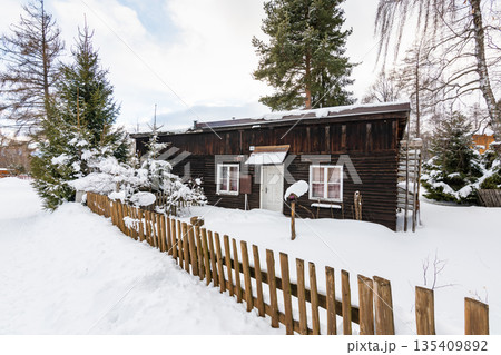 Small houses covered with snow in winter at Slovakia High Tatras mountains. Winter weather. 135409892