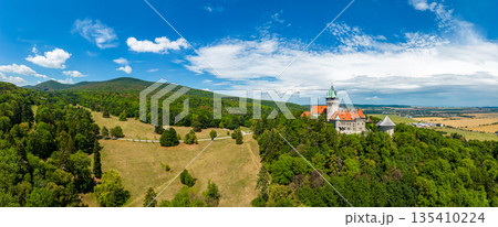 Aerial drone fly near Smolenice castle, Slovakia. Trnava region, Litle Carpathians. Aerial drone fly near Smolenice castle, Slovakia. Trnava region, Litle Carpathians. 135410224