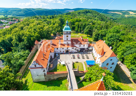Famous medieval castle Bouzov, Czech Republic. National landmark built in 14 century. Famous tourist destination. Summer weather, blue sky. 135410281