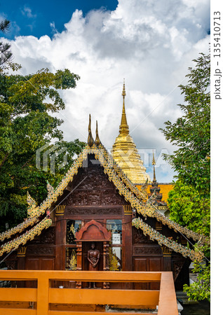 Wat Phra That Doi Suthep, famous golden temple with gold pagoda near the Chiang Mai city, Thailand. 135410713