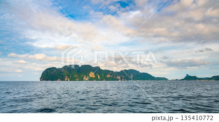 View of limestone rock at Ko Phi Phi islands, Thailand. View from long tailed boat. Exotic and tropic nature, summer paradise. 135410772