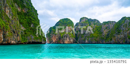 View of famous Maya Bay, Thailand. One of the most popular beach in the world. Ko Phi Phi islands. Beach without people. 135410791