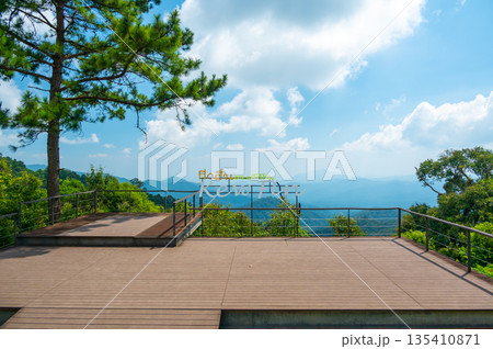Panoramatic view of Kew Fin viewpoint near the Mae Kampong village and Chiang Mai city, Thailand. View of mountains and hills in sunny day. Panoramatic view of Kew Fin viewpoint near the Mae Kampong village and Chiang Mai city, Thailand. View of mountains and hills in sunny day. 135410871