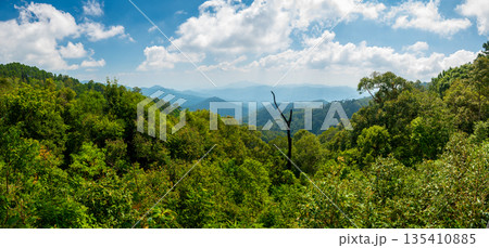 Panoramatic view of Kew Fin viewpoint near the Mae Kampong village and Chiang Mai city, Thailand. View of mountains and hills in sunny day. 135410885