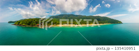 Aerial drone view of tropical beach at Ko Lanta island, Thailand. Coastline view of famous target destination. Pure turquoise water and white sand. 135410951