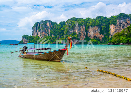 Long tail boats at Railay beach, Krabi, Thailand. Tropical paradise, turquoise water and white sand. 135410977