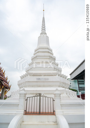 Wat Rakhang Kositaram buddhist temple at Bangkok, Thailand. White temple with pagoda, religion building. 135410989
