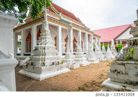Wat Rakhang Kositaram buddhist temple at Bangkok, Thailand. White temple with pagoda, religion building. Wat Rakhang Kositaram buddhist temple at Bangkok, Thailand. White temple with pagoda, religion building. 135411008