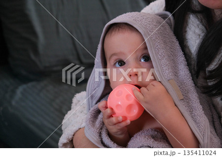 Mother and Baby Bonding with Glowing Toy 135411024