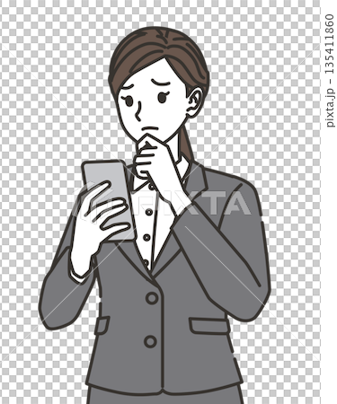 A woman in a suit thinking while looking at her smartphone A woman in a suit thinking while looking at her smartphone 135411860