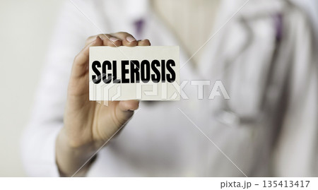SCLEROSIS. Card with text in hand of Medical Doctor. 135413417