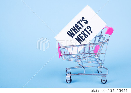 What's next text in shopping trolley .trends research and new things. business startup concepts 135413431