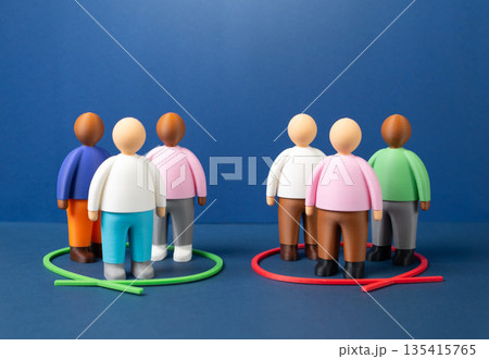 Society is divided into two groups based on an issue or opinion. A split in society. Polarization concept, social tension and conflicting values. Public debate, media influence and division risks Society is divided into two groups based on an issue or opinion. A split in society. Polarization concept, social tension and conflicting values. Public debate, media influence and division risks 135415765