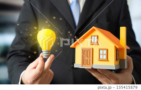 A house and a burning light bulb. Smart home. Electricity and autonomy. Energy efficient living, connected home systems and backup power solutions. Digital comfort, smart technology A house and a burning light bulb. Smart home. Electricity and autonomy. Energy efficient living, connected home systems and backup power solutions. Digital comfort, smart technology 135415879