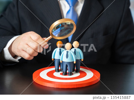 A businessman studies his target audience of office workers and clerks. Evaluating effectiveness and feedback. Market research, consumer behavior analysis and business optimization 135415887