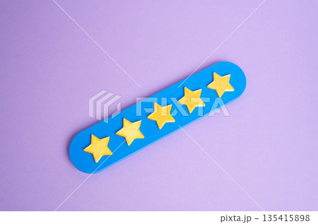 Five stars out of five. The highest rating for a business or product. Popularity rating. Customer satisfaction symbol, reputation management and confident purchase decisions in digital marketplaces 135415898
