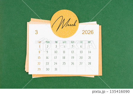 March 2026 calendar page on green background. 135416090