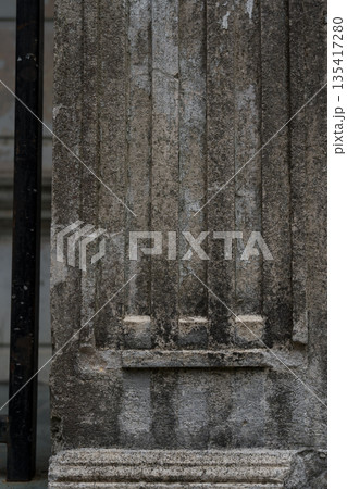 design of an old, shabby, dirty column. The column in close-up 135417280