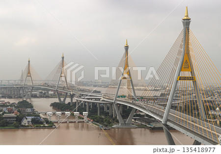 Serving as a vital link between Bangkok and Samut Prakan, the Bhumibol Bridgs, formally the Industrial Ring Road Bridgs. Serving as a vital link between Bangkok and Samut Prakan, the Bhumibol Bridgs, formally the Industrial Ring Road Bridgs. 135418977