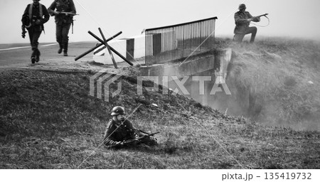 German Infantry Soldiers Fighting With Russian Soldiers. Mortar Shooting, Explosions. Black And White German Infantry Soldiers Fighting With Russian Soldiers. Mortar Shooting, Explosions. Black And White 135419732