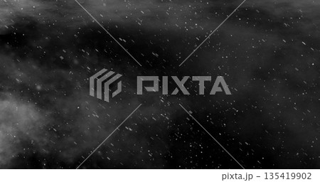 Freeze motion of natural snow falling with fog on black background 135419902