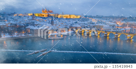 High Resolution Panorama Picture of Winter Snowy Prague Old Town with Prague Castle and Charles Bridge above River Vltava during Sunset , Czech republic 135419943