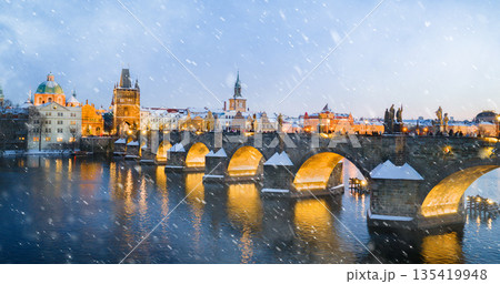High Resolution Panorama Picture of Winter Snowy Prague Old Town with Prague Castle and Charles Bridge above River Vltava during Sunset , Czech republic High Resolution Panorama Picture of Winter Snowy Prague Old Town with Prague Castle and Charles Bridge above River Vltava during Sunset , Czech republic 135419948