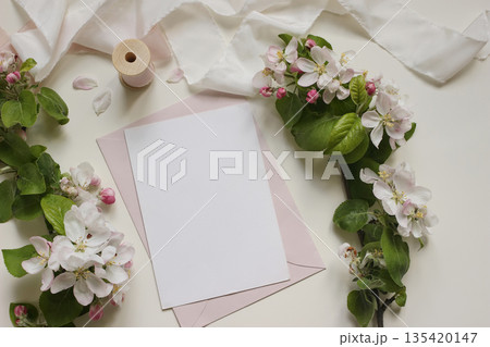 Blank Easter Greeting Card, Pink Envelope Mockup with Apple Blossoms. Spring Floral Flat Lay, Top View. Minimal Stationery Background for Wedding Invitation, Branding Romantic Design. Empty Copy Space Blank Easter Greeting Card, Pink Envelope Mockup with Apple Blossoms. Spring Floral Flat Lay, Top View. Minimal Stationery Background for Wedding Invitation, Branding Romantic Design. Empty Copy Space 135420147