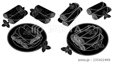 Delicious crepes rolled and garnished with fresh mint leaves for a delightful presentation Delicious crepes rolled and garnished with fresh mint leaves for a delightful presentation 135422469