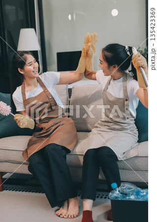 Cleaners clean empty office spaces Cleaners clean empty office spaces 135423369