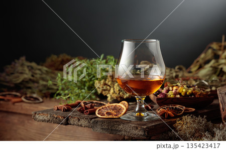 Herbal bitter liqueur and natural ingredients. Herbal bitter liqueur and natural ingredients. 135423417