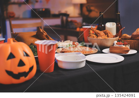 Friends enjoying a Halloween party at a bar making a toast Friends enjoying a Halloween party at a bar making a toast 135424091