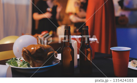 Friends enjoying a Halloween party at a bar making a toast 135424103