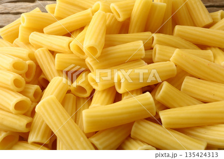 Classic macaroni bolognese with tomato meat sauce and grated cheese topping. Classic macaroni bolognese with tomato meat sauce and grated cheese topping. 135424313