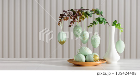 Hanging Easter Eggs and Spring Branches in Vase. Festive Pastel Decor 135424488